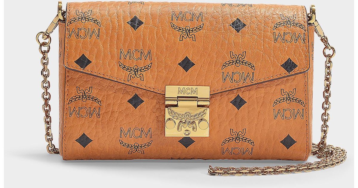 MCM Millie Visetos Small Crossbody Bag In Cognac Coated Canvas in Brown