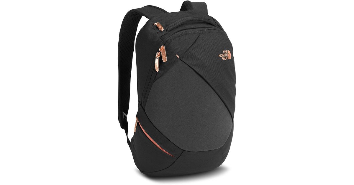 black and coral north face backpack