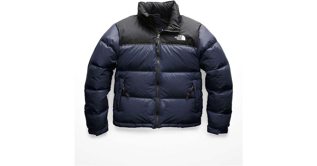 navy north face puffer jacket