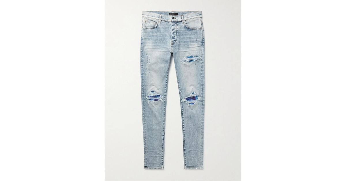 Amiri Mx1 Skinnyfit Tiedyed Drilltrimmed Distressed Jeans in Blue