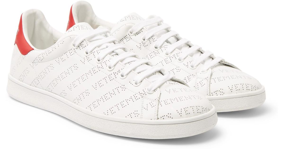 white perforated sneakers