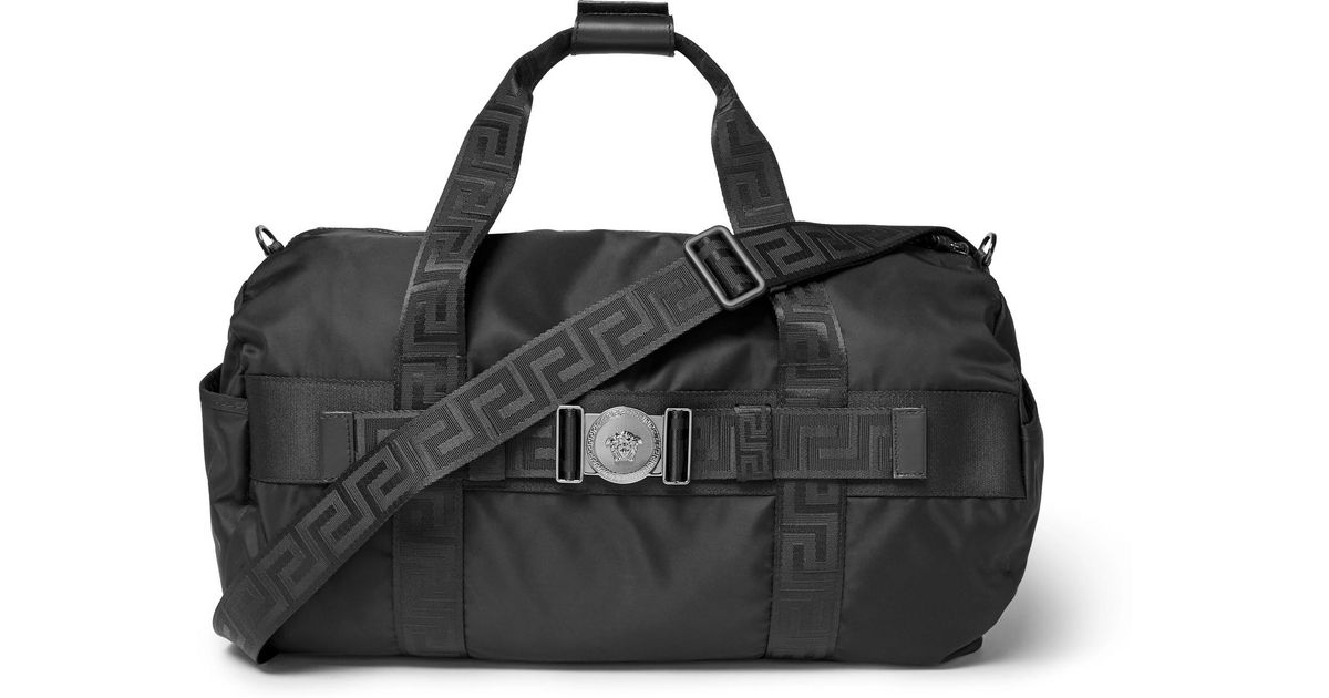 Versace Logo-embellished Nylon Duffle Bag in Black for Men | Lyst