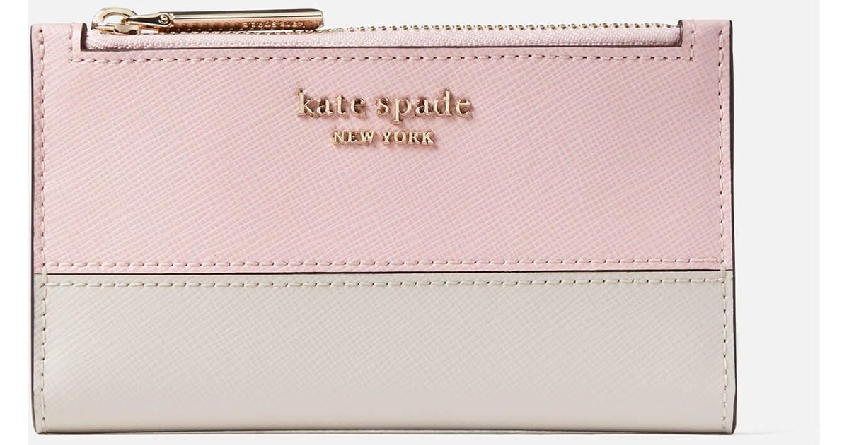 Kate Spade Spencer Small Slim Bifold Wallet in Pink | Lyst Canada