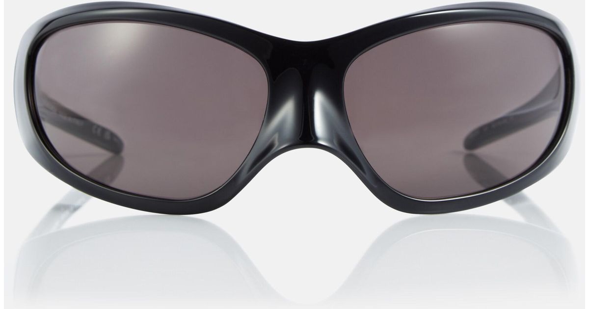 Balenciaga Skin Oval Sunglasses in Brown | Lyst
