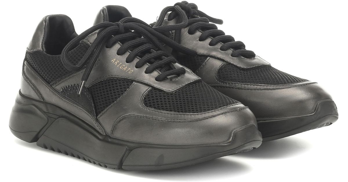 axel arigato all black