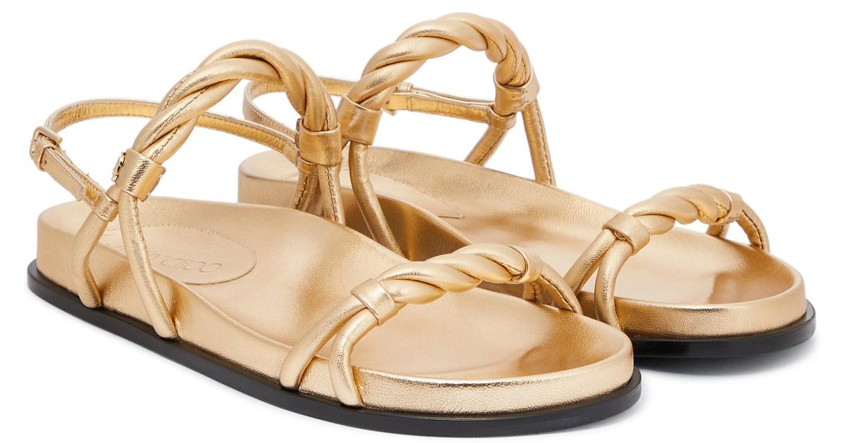 Jimmy Choo Diosa Twisted Flat Leather Sandals in Gold (Metallic) | Lyst