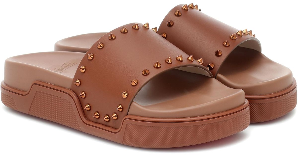 christian louboutin studded slides