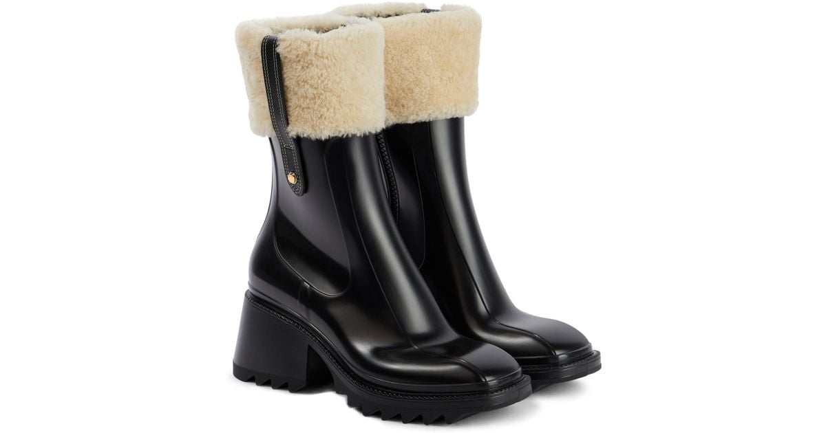 Chloé Betty Shearlingtrimmed Pvc Boots Lyst