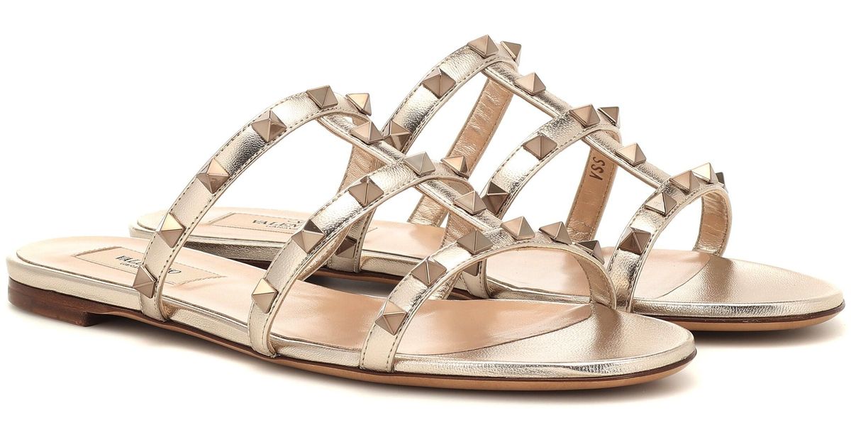 valentino rockstud flat sandals gold