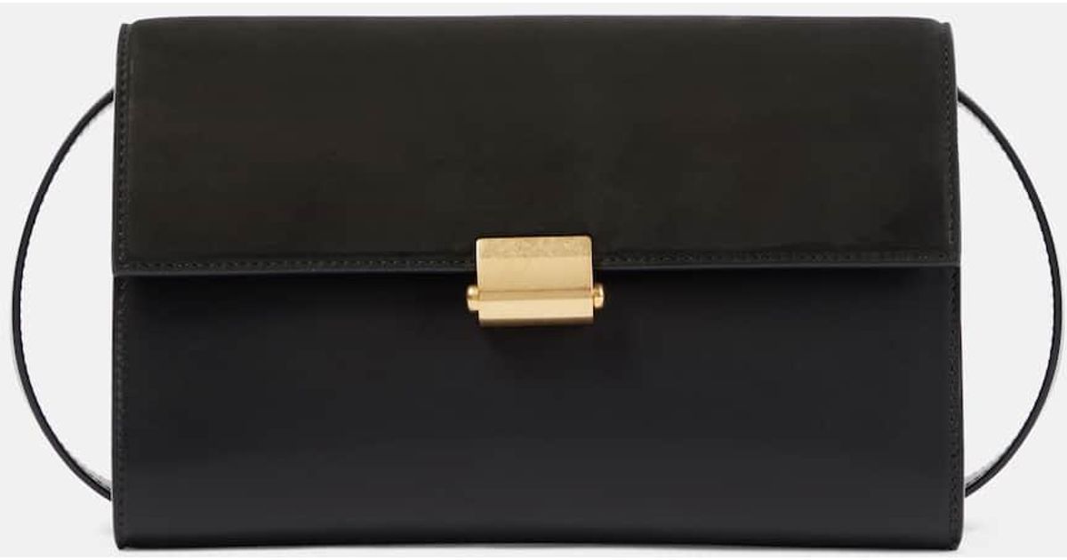 おしゃれ ★ THE ROW Laurie suede and leather crossbody bag Laurie suede and leather crossbody bag in black - The Row