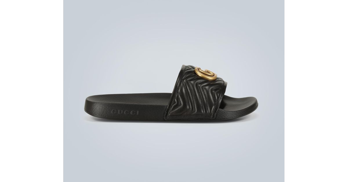 Gucci Pursuit Logoembossed Leather Slides in Black Lyst
