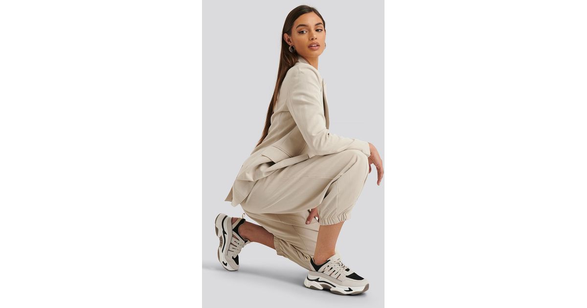 beige chunky trainers