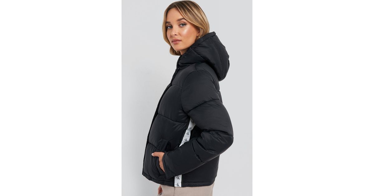 calvin klein monogram tape lw puffer