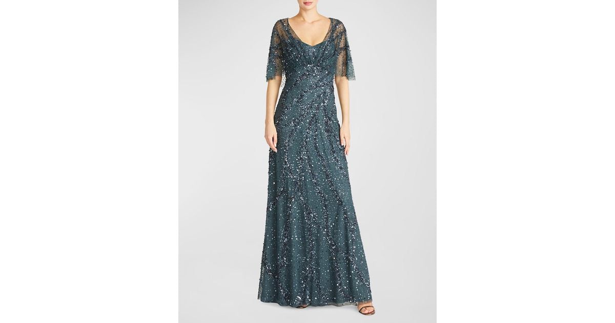 THEIA Lavinia Sequin A-line Cape Gown in Blue | Lyst