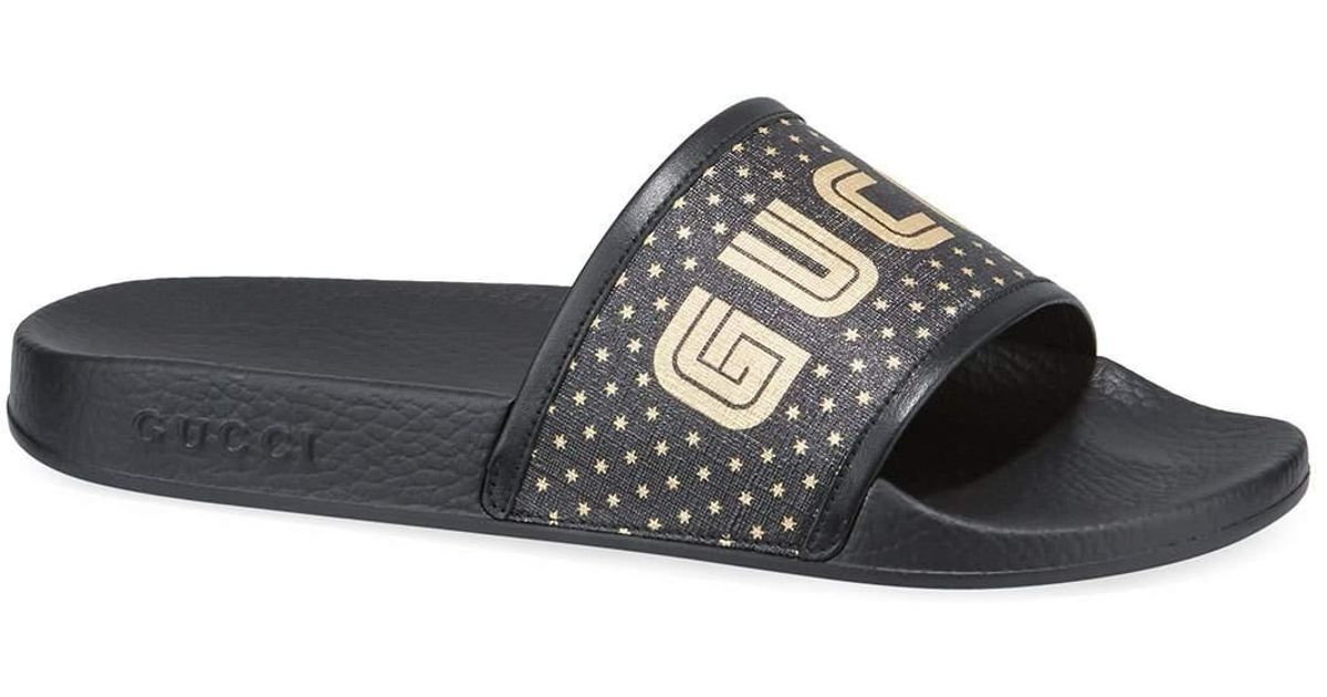 black and gold gucci slides