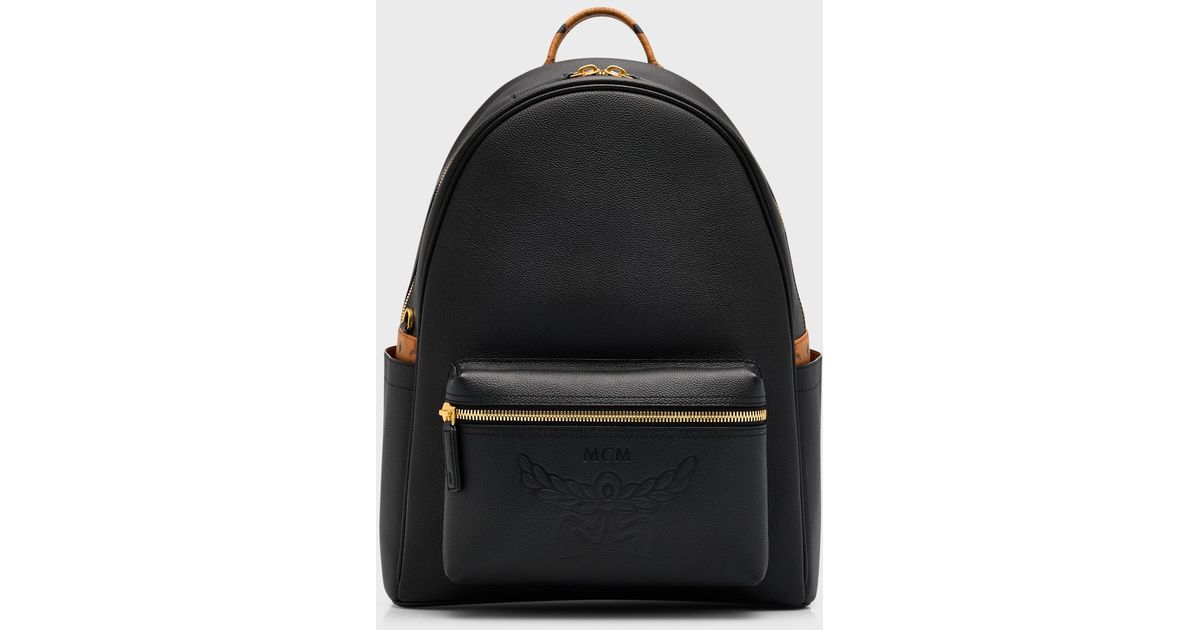 MCM Stark Embossed Logo Leather Backpack in Black for Men Lyst
