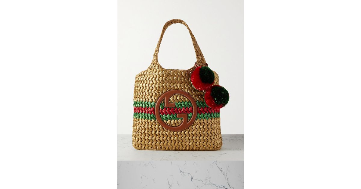 Embellished leather-trimmed metallic crocheted raffia tote
