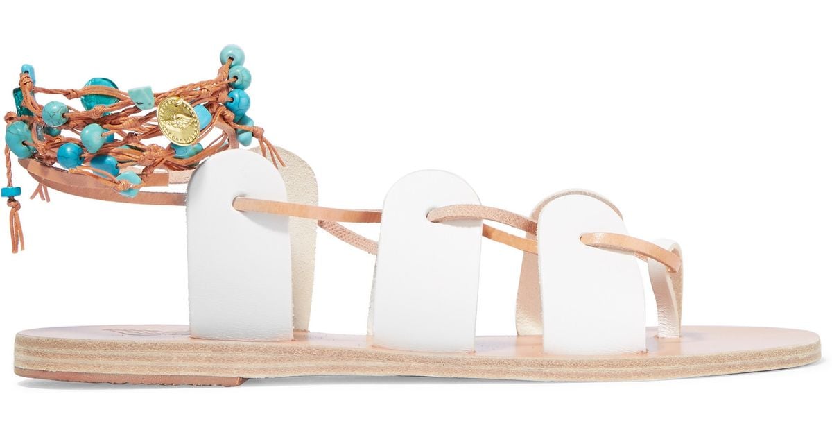 white ancient greek sandals