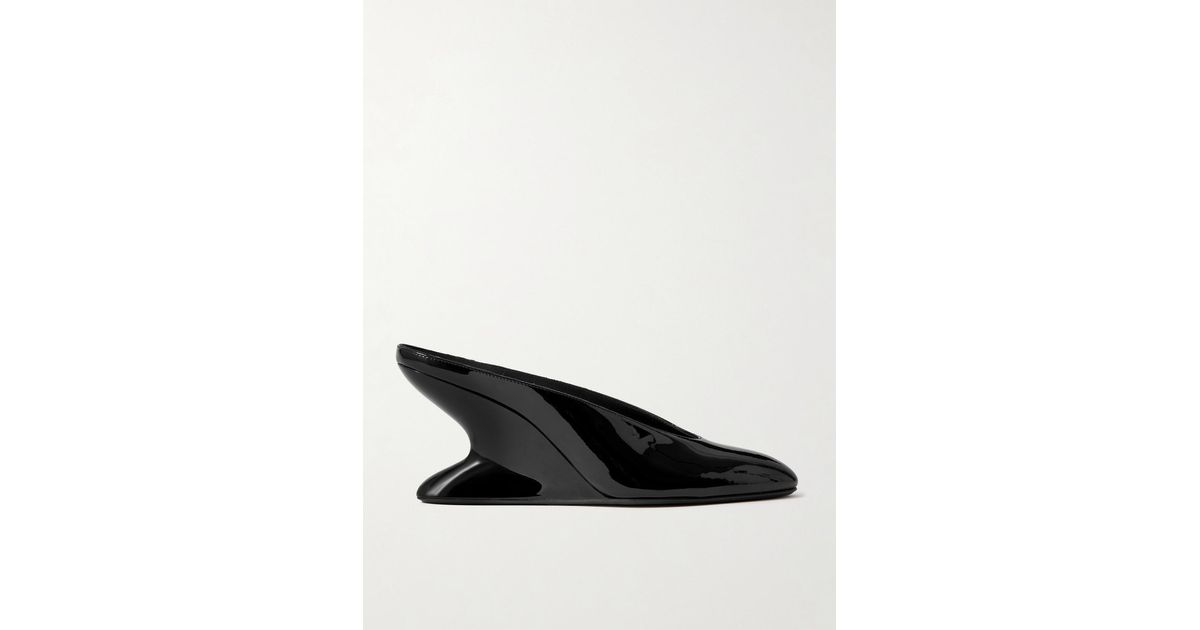 ALAIA 26S HIGH-HEEL WEDGE MULES 95 MM IN BLACK GLOSSY CALFSKIN
