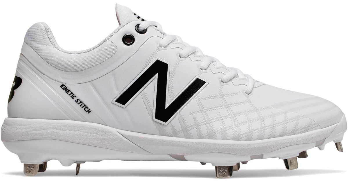 triple white new balance cleats