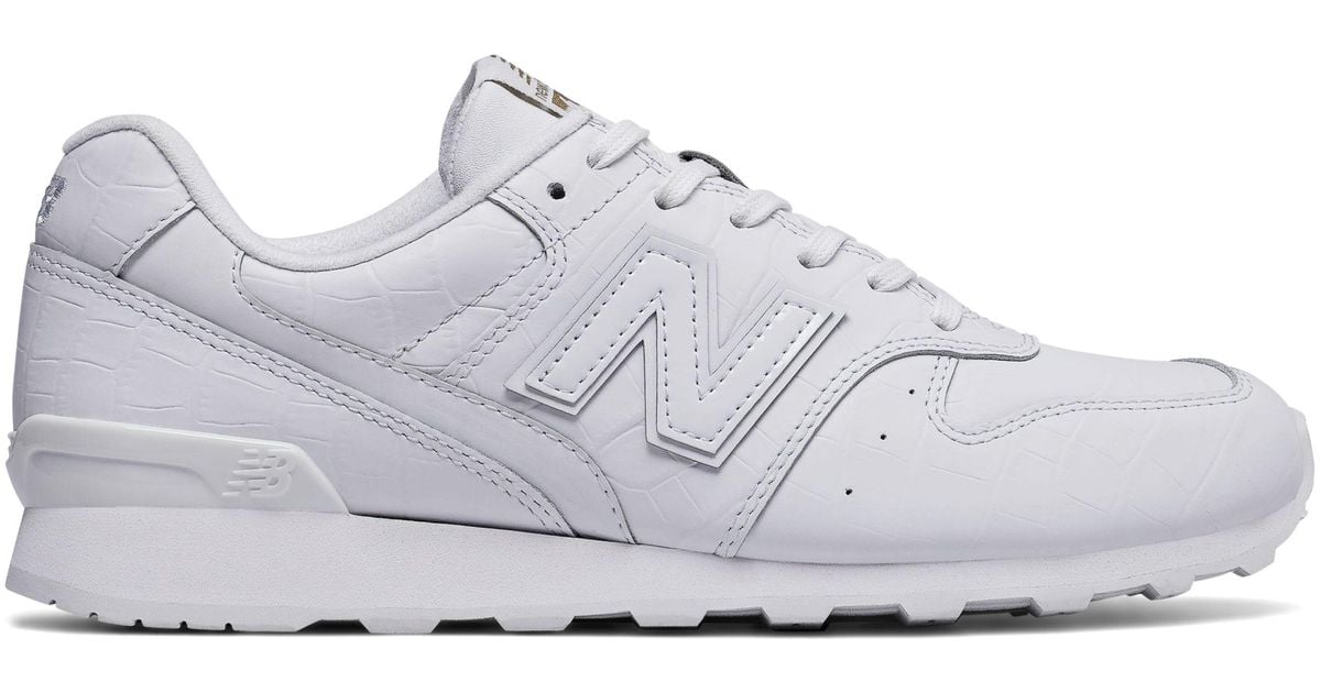 new balance all white leather shoes