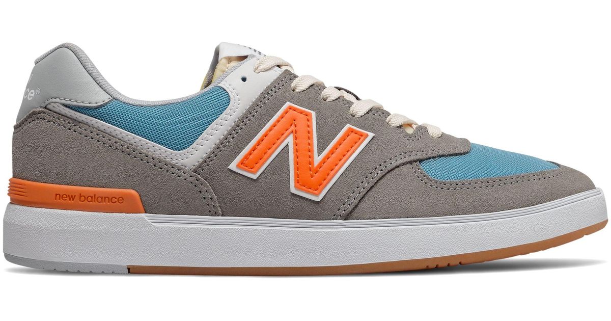 new balance dark grey all coasts 574 trainers