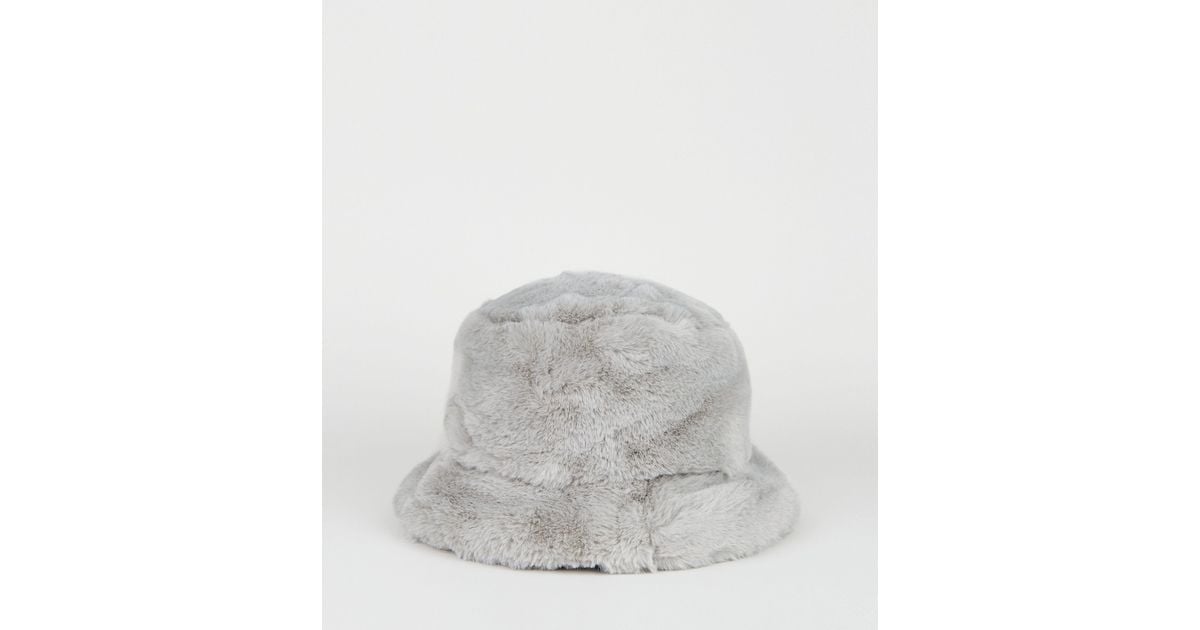 white faux fur bucket hat