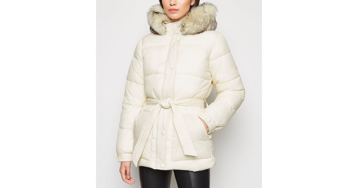 white belted puffer coat