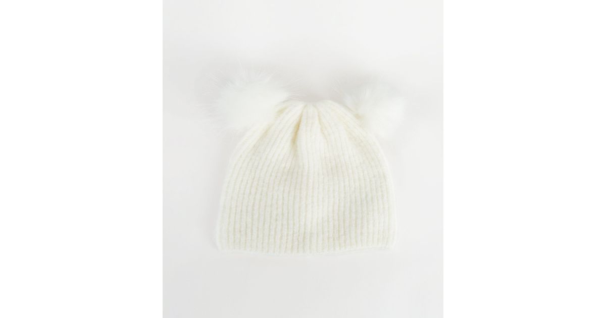 girls white bobble hat