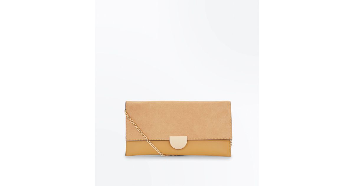 new look mustard clutch bag