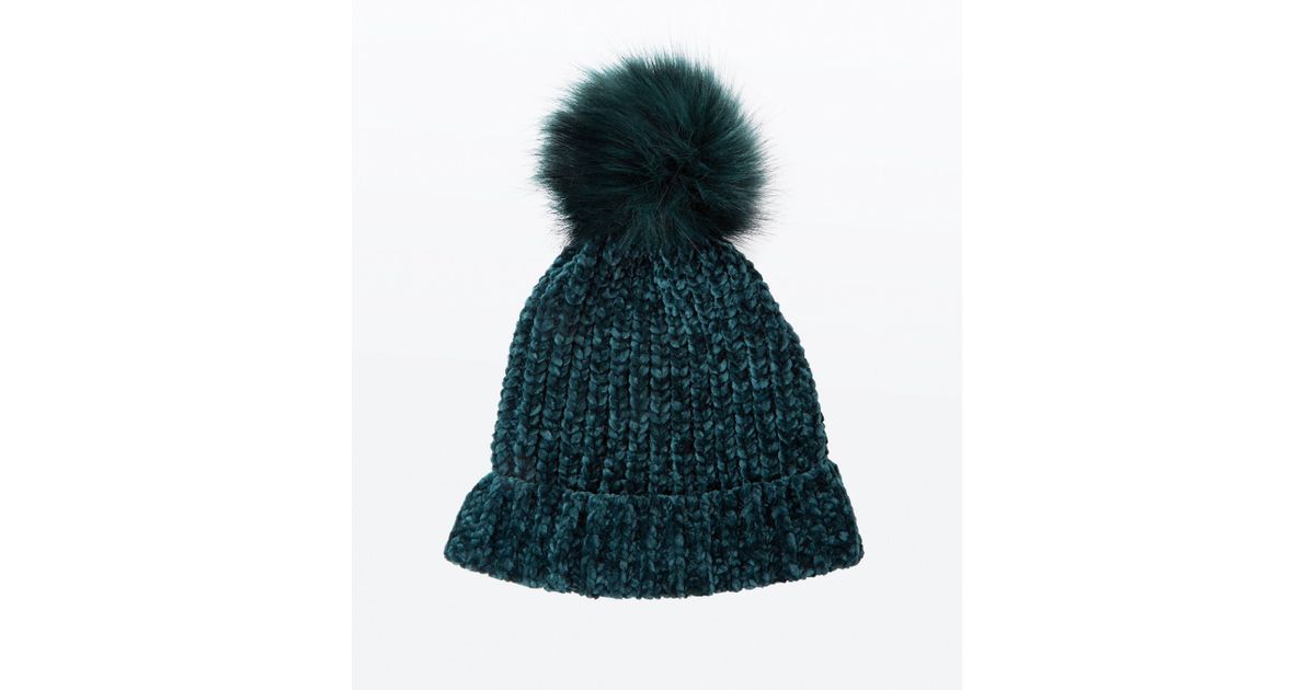 dark green bobble hat