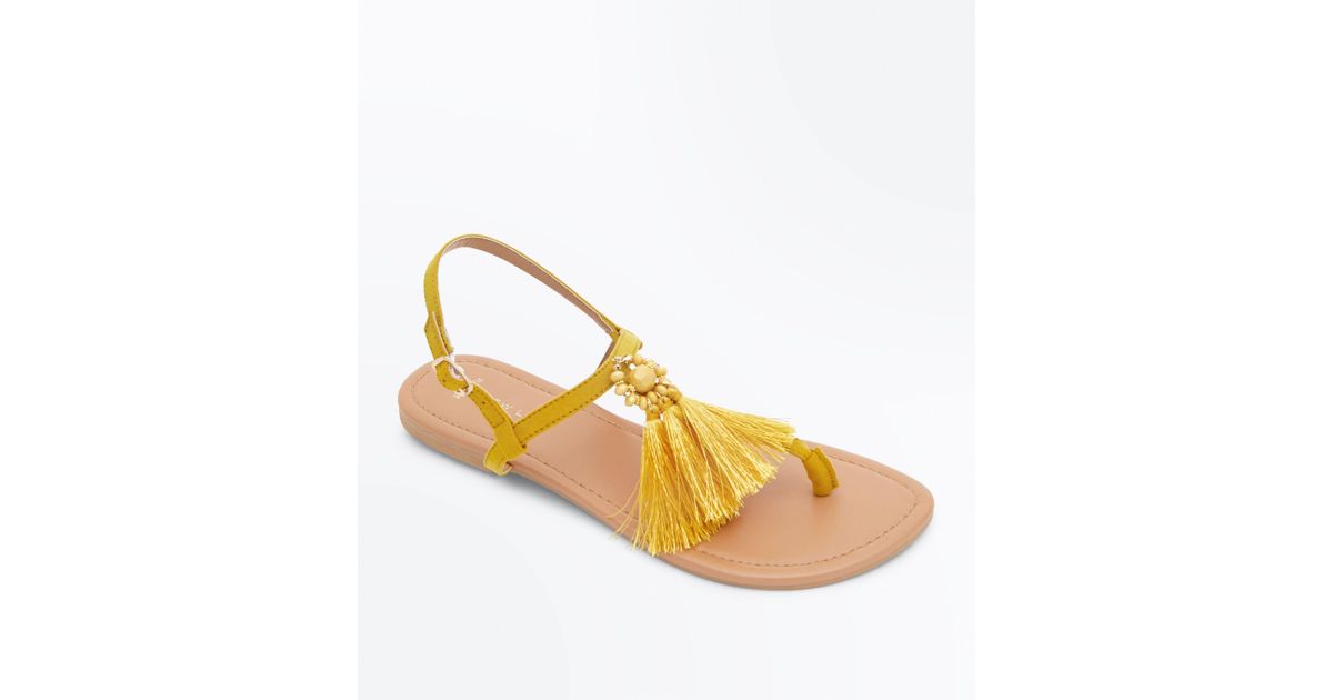 mustard flip flops