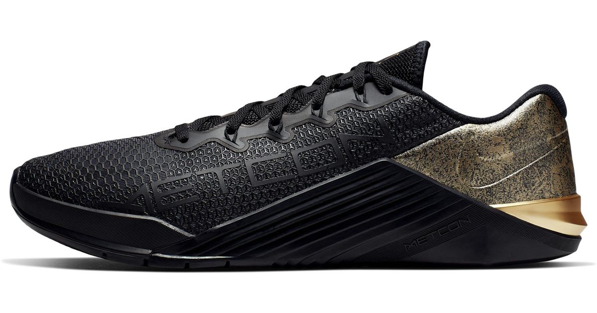black and gold metcons