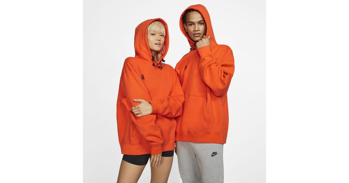 neon orange sweatsuit