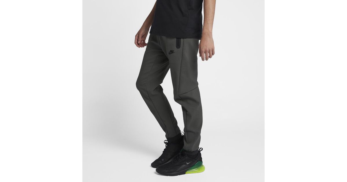 nike sportswear tech track pants