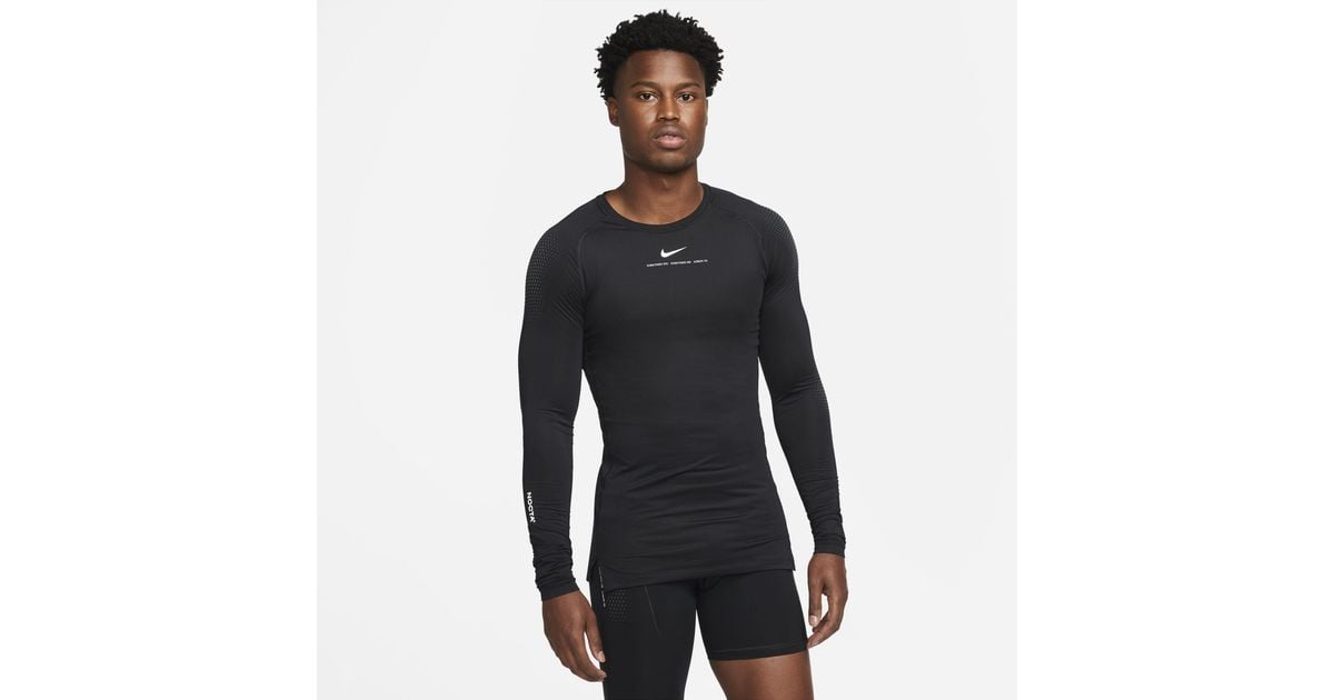 Nike Nocta Longsleeve Base Layer Basketball Top in Black,White (Black