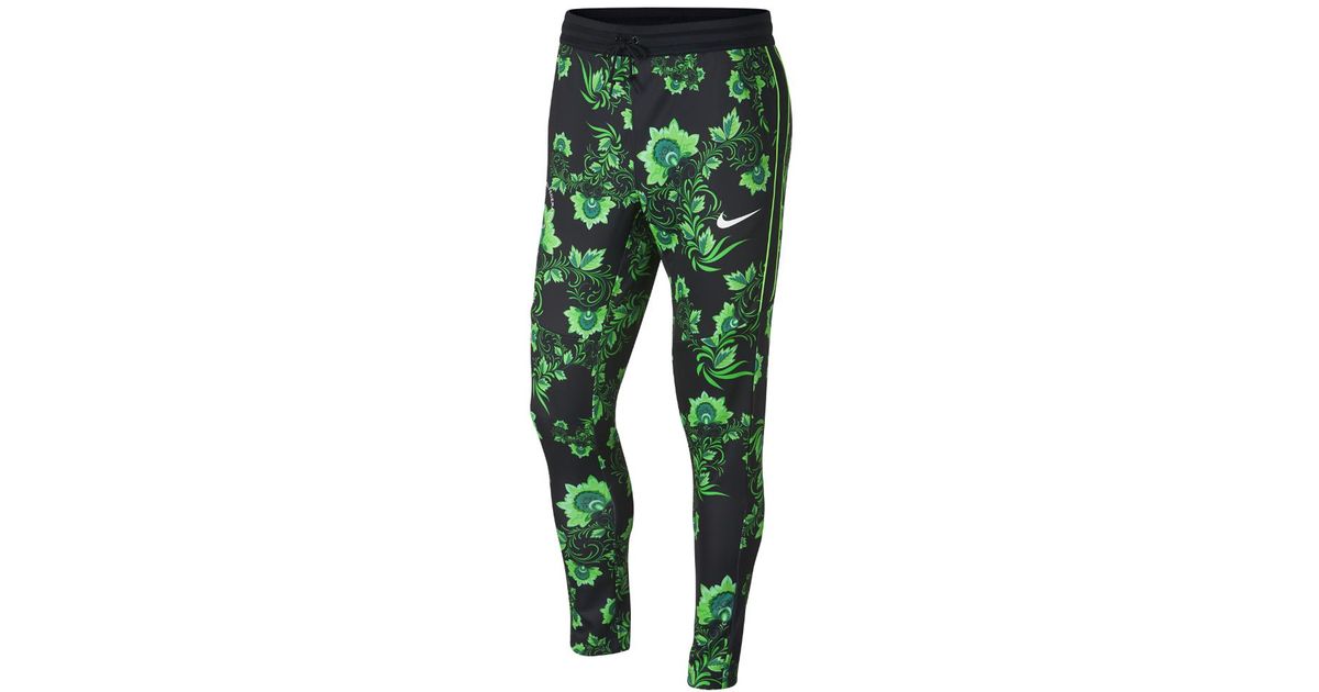 nike tribute sweatpants in green