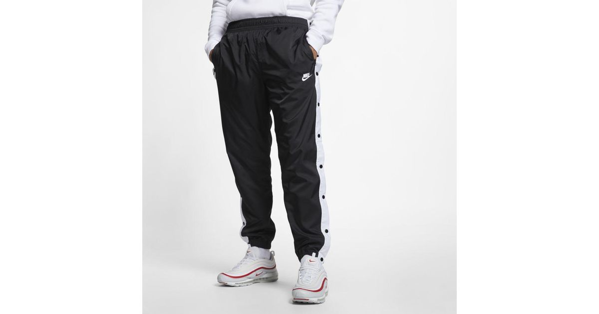 nike sportswear men's woven track pants