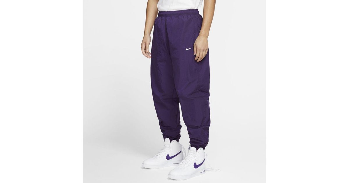 Nrg Tapered Logo-embroidered Shell Track Pants Purple for Men | Lyst
