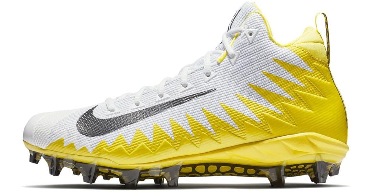 black and yellow football cleats