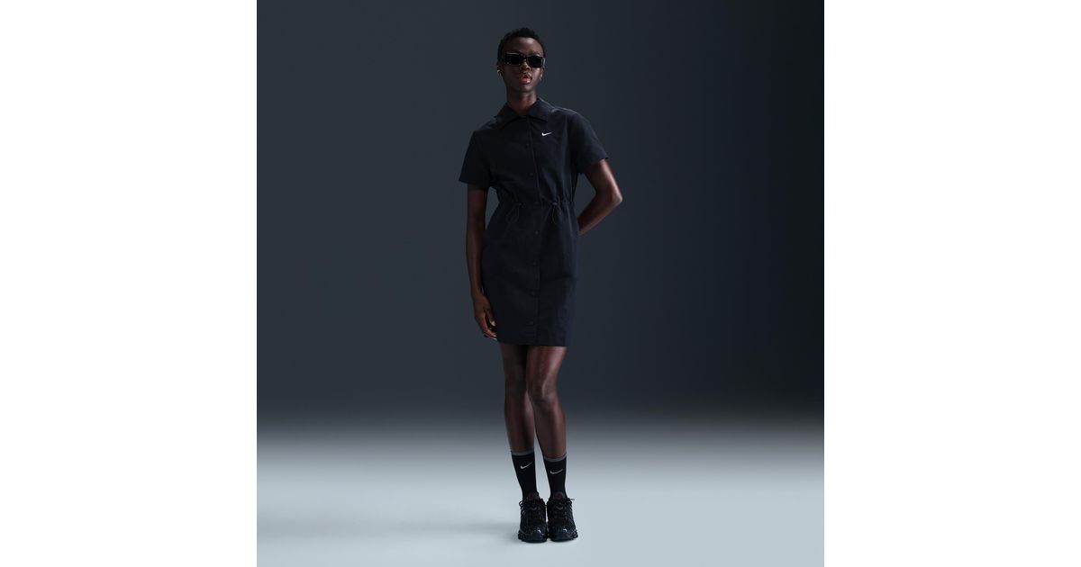 ★ Nike★ Sportswear Everything Woven Short Sleeve Mini Dre Nike Everything woven dress in black | ASOS