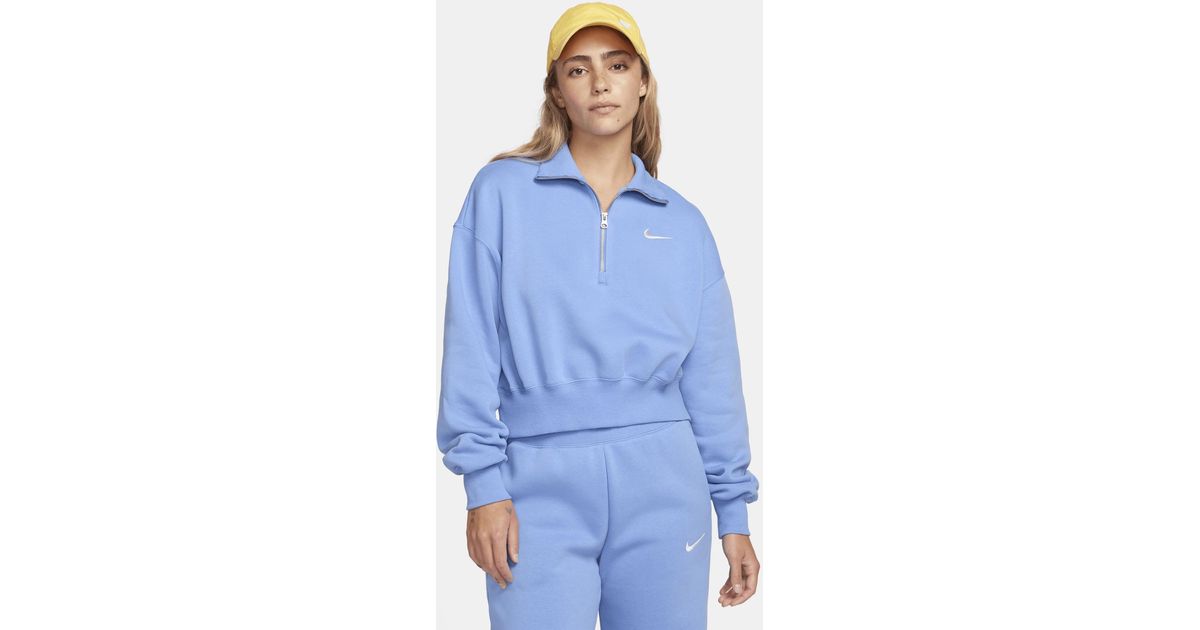Light blue nike quarter zip sale