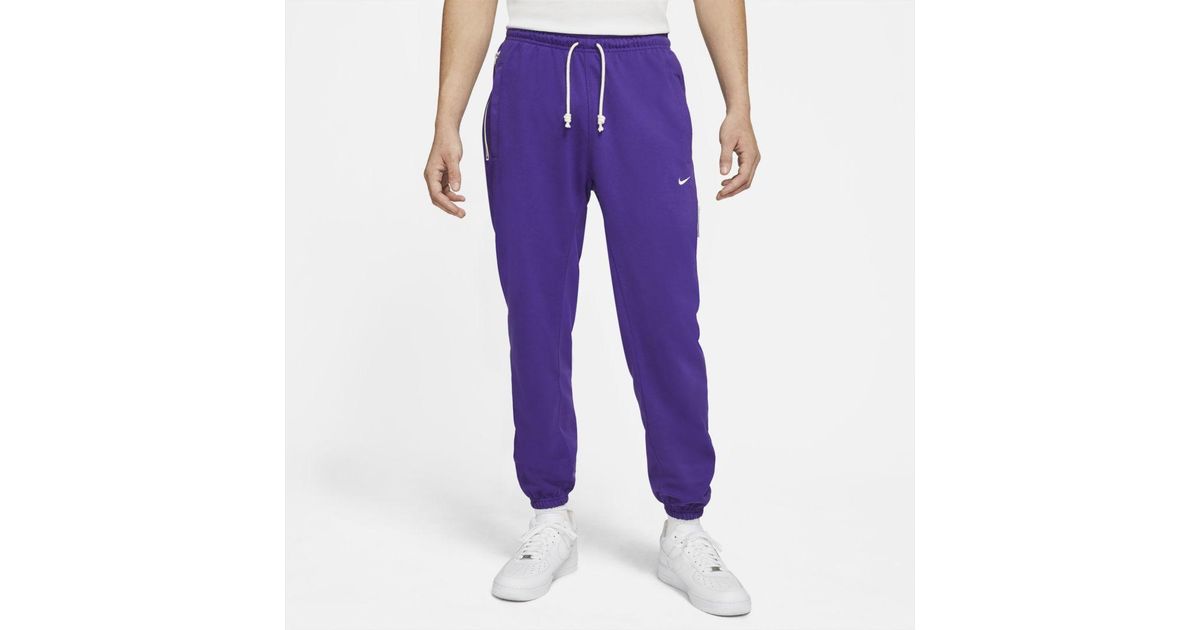 nike men's standard issue dri fit pants