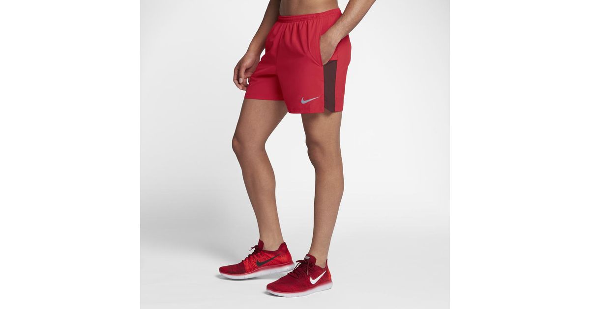 red nike running shorts