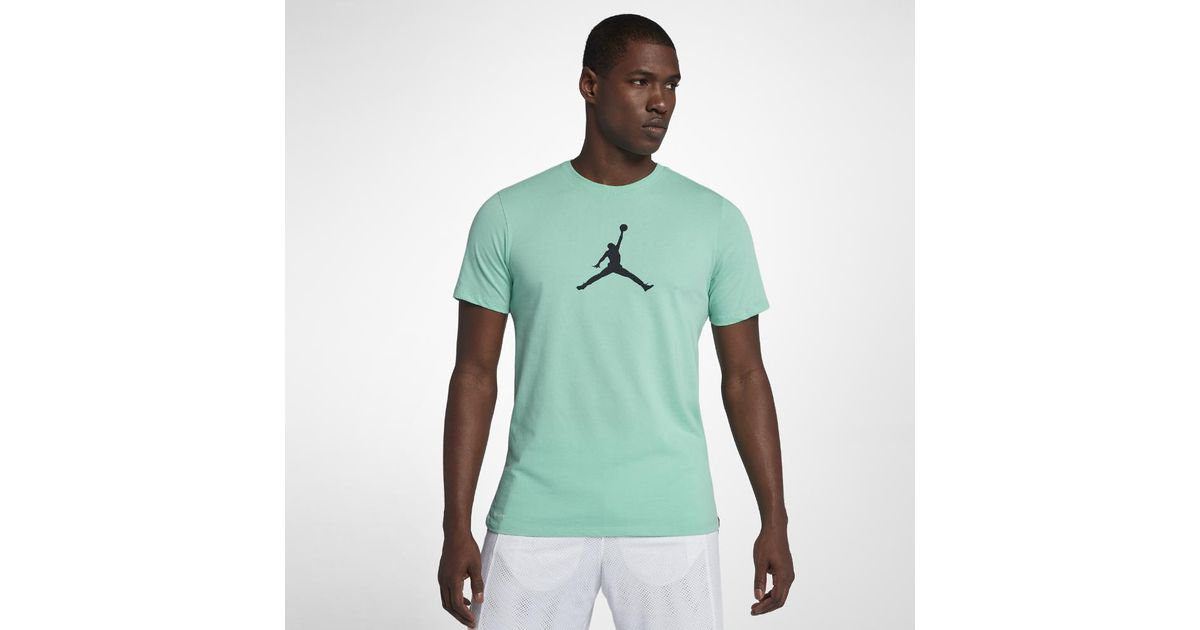 emerald green nike shirt
