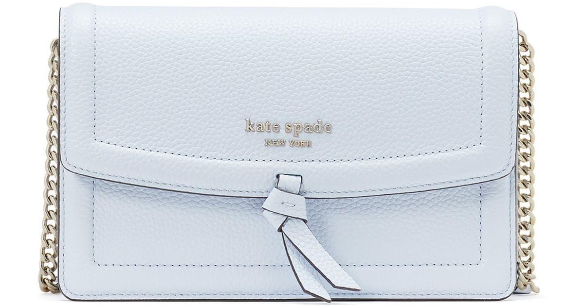 Kate Spade Knott Pebbled Leather Flap Crossbody Bag in White | Lyst