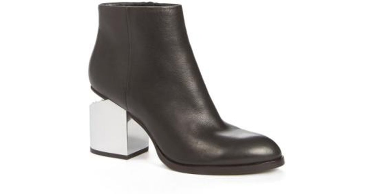 black booties with silver heel