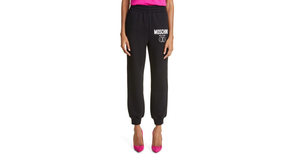 sweatpants with smiley face