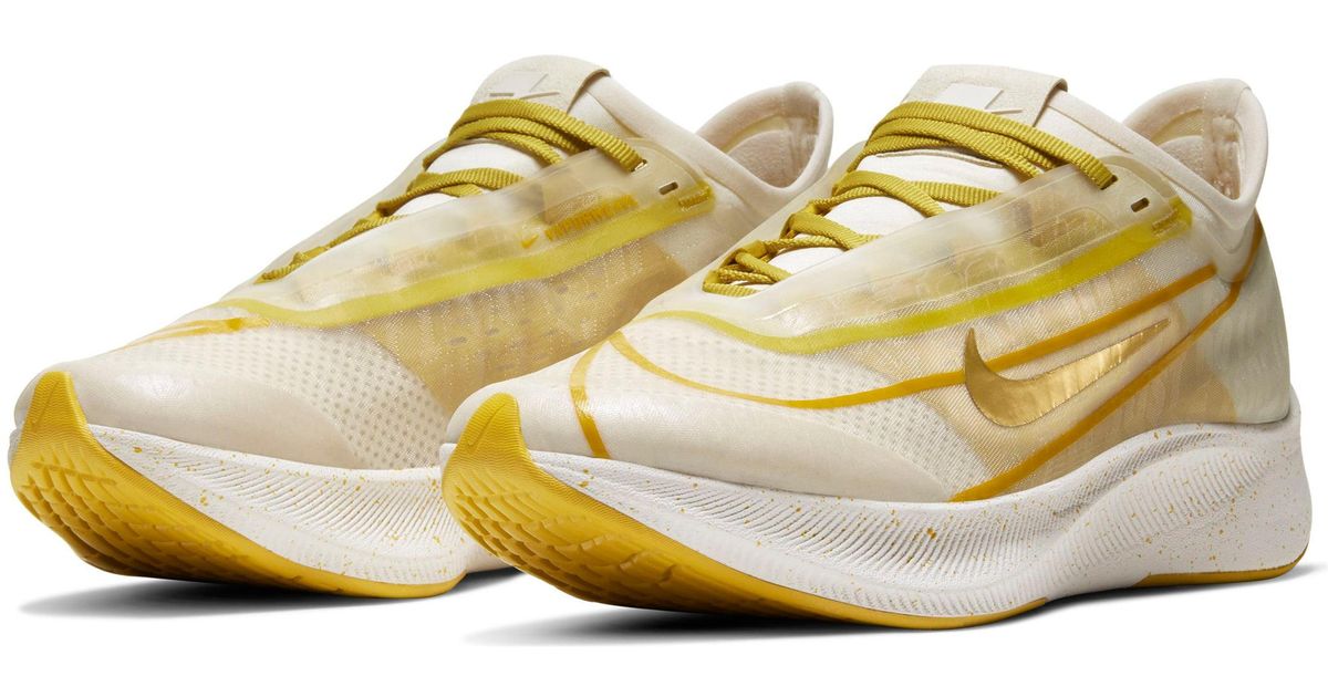 nike zoom fly 3 gold