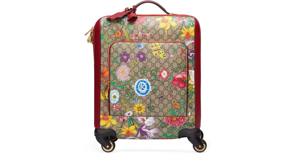 gucci rolling luggage